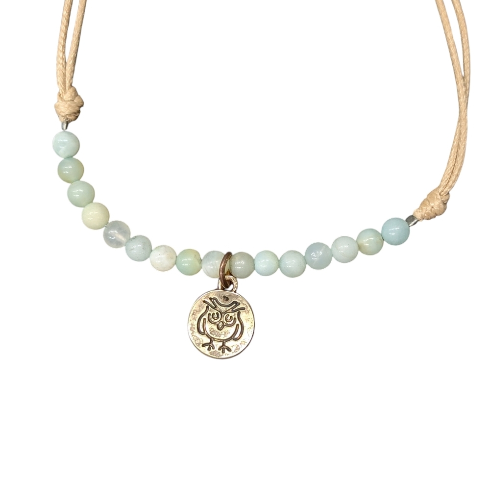 Adjustable cord bracelet with blue amazonite beads and owl charm